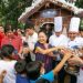 Marcos leads gift-giving for kids