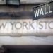 Shares dip on Wall Street’s slide, hawkish views