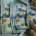 Peso weakens as dollar climbs