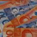 Peso slides to over two-year low