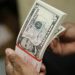 Dollar reserves inch up to $105.9B