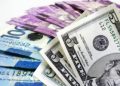 Peso falls to new low of P59.22 vs $1