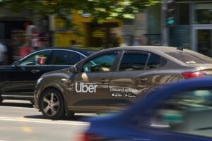 Uber drops 2030 all-electric target as chief executive warns EV shift is stalling